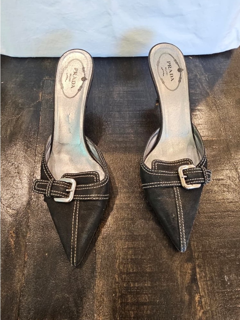 Prada Black Pointed-Toe Buckle Mules with White Stitching